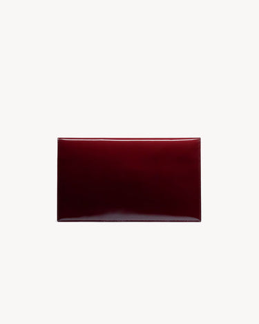 POCHETTE Saint Laurent UPTOWN IN PELLE VERNICIATA BOURDEAUX