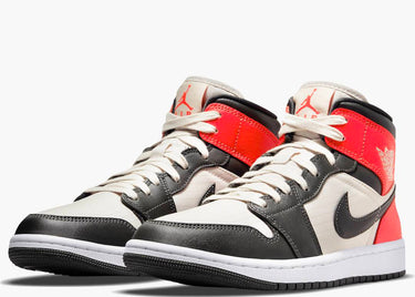 JORDAN 1 MID NEWSPRINT LIGHT OREWOOD BROWN (W)